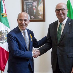 Enel, Starace menerima Order of the Aztec Eagle