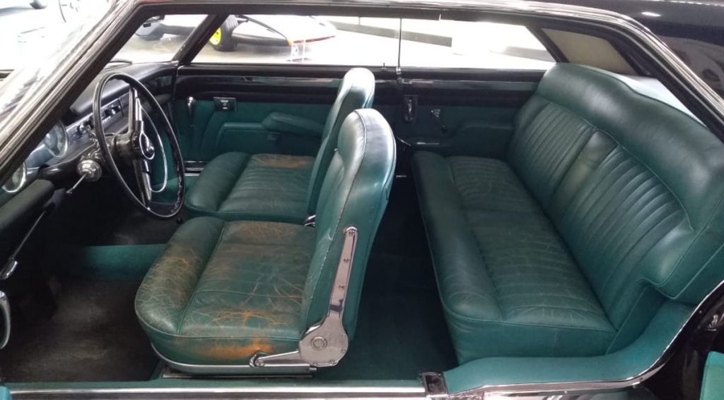 The interior of a vintage car designed by Pininfarina