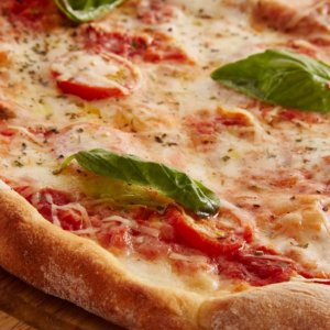 Hari Pizza: bisnis 15 miliar dolar, tetapi di Amerika mereka makan lebih banyak daripada di Italia