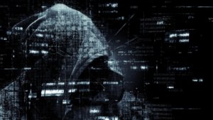 Hacker dietro allo sfondo di Cyber Security