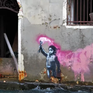 “Bambino migrante” di Banksy a Venezia: Banca Ifis finanzia il restauro