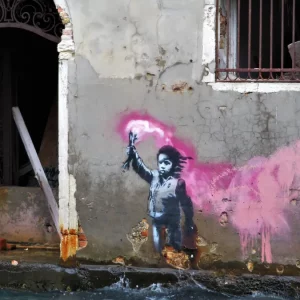 „Copilul Migrant” al lui Banksy la Veneția: Banca Ifis finanțează restaurarea