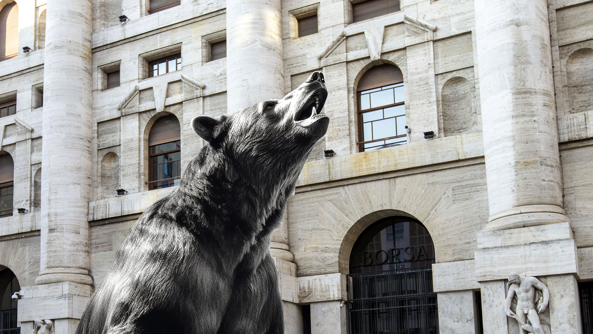 Trader in sala contrattazioni osserva schermi con grafici in rosso mentre borse europee scendono tra volatilità geopolitica e incertezza tech, immagine di approfondimento