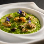 Un intrigante e raffinato dialogo fra terra e mare nella ricetta stellata di riso, finocchietto selvatico, limone e coquillages dello chef Alfio Nicolosi