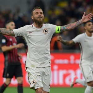 Roma mempermalukan Milan dan melewati Napoli. Inter kalah di Genoa